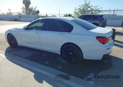 2015 BMW 740I из США, поврежденный, VIN WBAYA6C59FGK16663